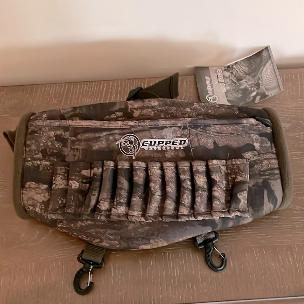 Cupped waterfowl hand warmer.